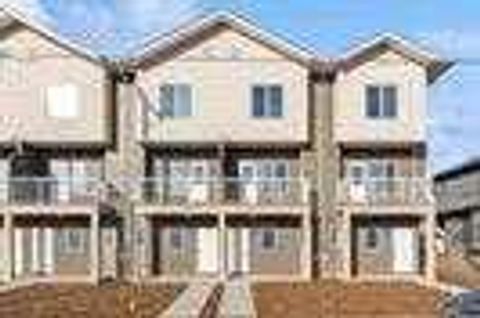Photo of 95 Saddlecrest Circle #105, Calgary, AB T3J 0Z2 (MLS # A2326472)