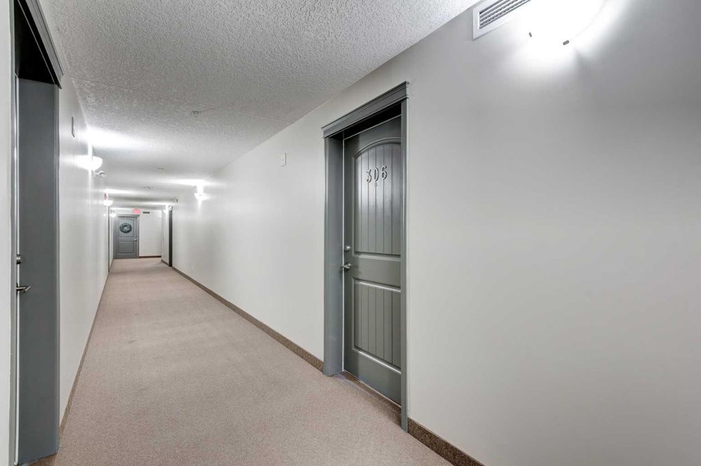 Photo of 406 Cranberry Park SE #306, Calgary, AB T3M 1Y9 (MLS # A2278452)