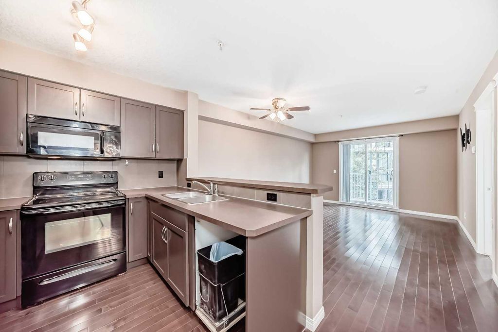 Photo of 115 Prestwick Villas SE #2224, Calgary, AB T2Z 0M8 (MLS # A2321134)