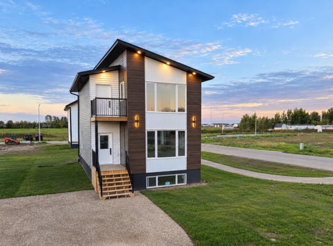 Photo of 10302 105 Ave, La Crete, AB T0H 2H0 (MLS # A2344790)