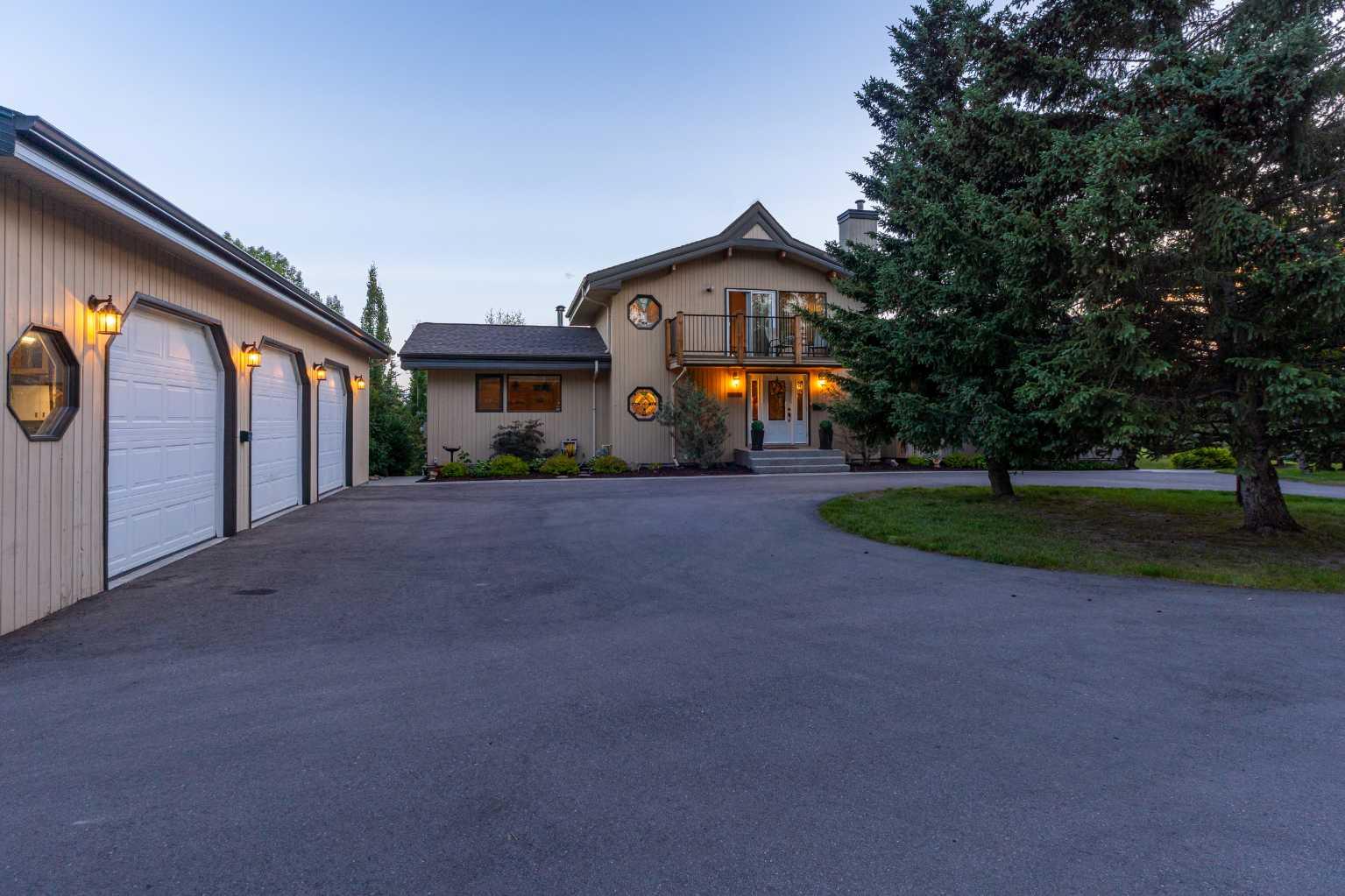 116 Bearspaw Village Crescent