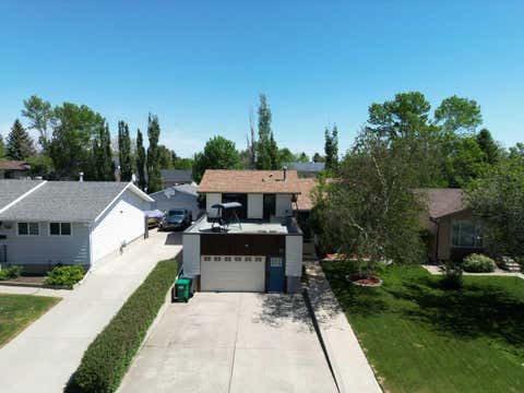 Photo of 77 Iroquois Crescent W, Lethbridge, AB T1K 5J3 (MLS # A2316274)