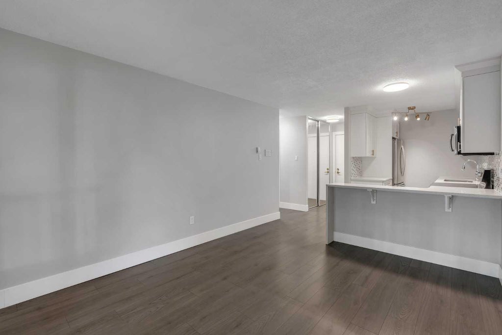 Photo of 1015 14 Avenue SW #103, Calgary, AB T2R 0N9 (MLS # A2349440)