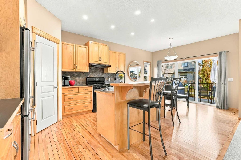 Photo of 112 Eversyde Way SW, Calgary, AB T2Y 4V5 (MLS # A2354407)