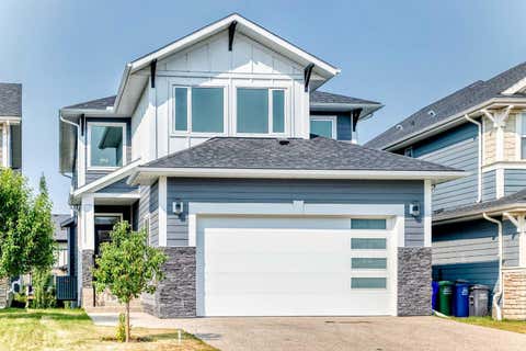 Photo of 79 Sundown Way, Cochrane, AB T4C 0H4 (MLS # A2335897)