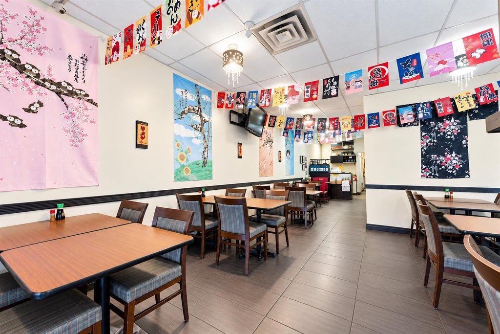 Photo of 920 36 Street NE, Calgary, AB T2A 6L8 (MLS # A2349638)