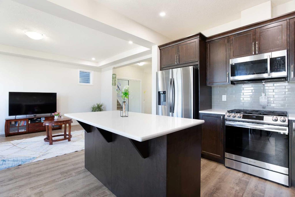 Photo of 673 Windrow Manor SW, Airdrie, AB T4B 5H5 (MLS # A2323090)