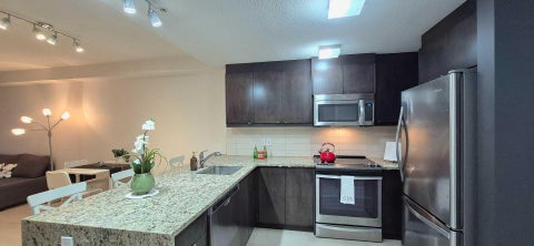 Photo of 15 ASPENMONT Heights SW #206, Calgary, AB T3H 0E3 (MLS # A2338660)