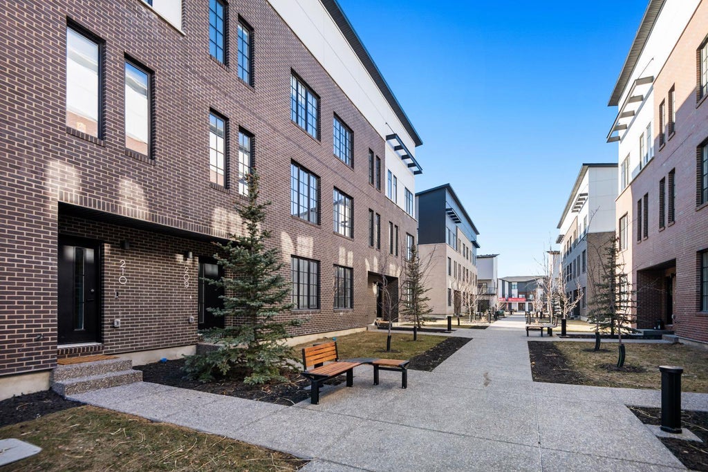 Photo of 8155 8 Avenue SW #203, Calgary, AB T3H 6B1 (MLS # A2318061)