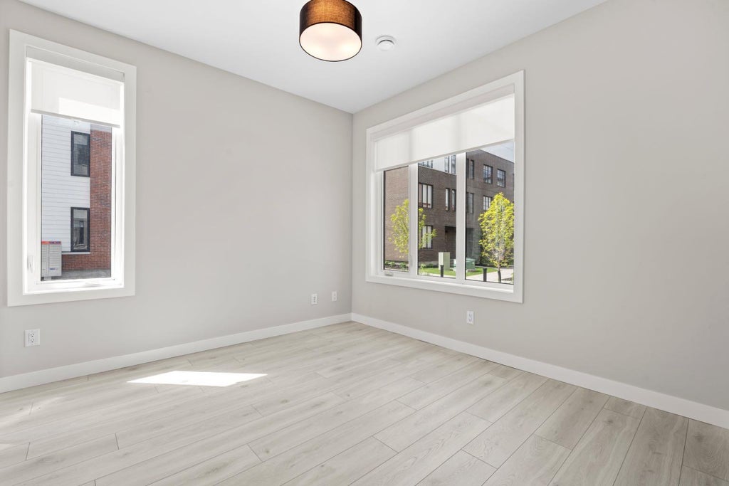 Photo of 8155 8 Avenue SW #203, Calgary, AB T3H 6B1 (MLS # A2318061)