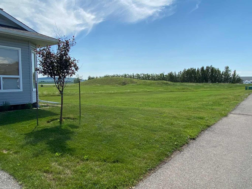 Photo of 168/172 Ridge Stone Lane, Diamond Valley, AB T0L 0H0 (MLS # A2264755)