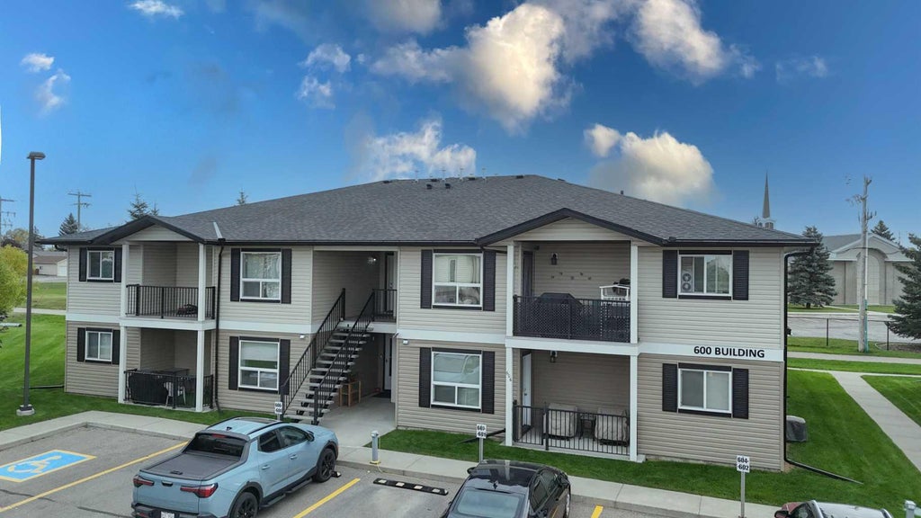 Photo of 8 Bayside Place #601, Strathmore, AB T1P 0E1 (MLS # A2341122)