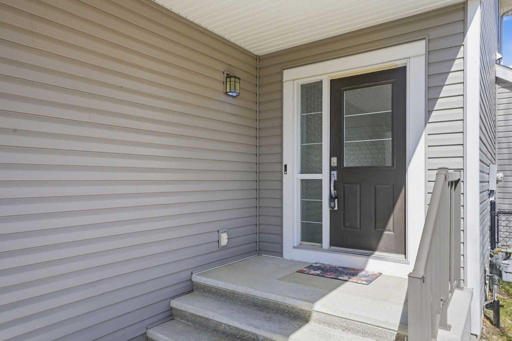 Photo of 312 Sunset View, Cochrane, AB T4C 0N6 (MLS # A2303836)