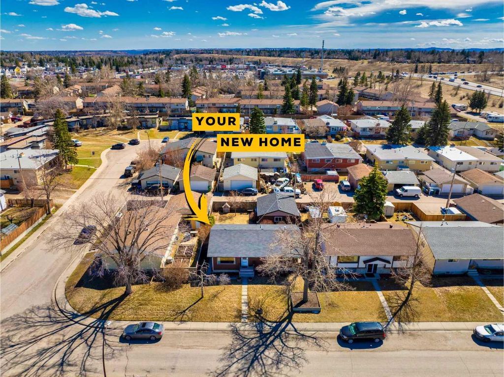 Photo of 23 Queen Isabella Close SE, Calgary, AB T2J 3R2 (MLS # A2303904)