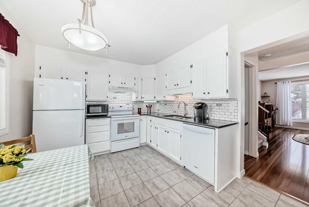 Photo of 24 Cedarwood Hill SW, Calgary, AB T2W 3J2 (MLS # A2292137)
