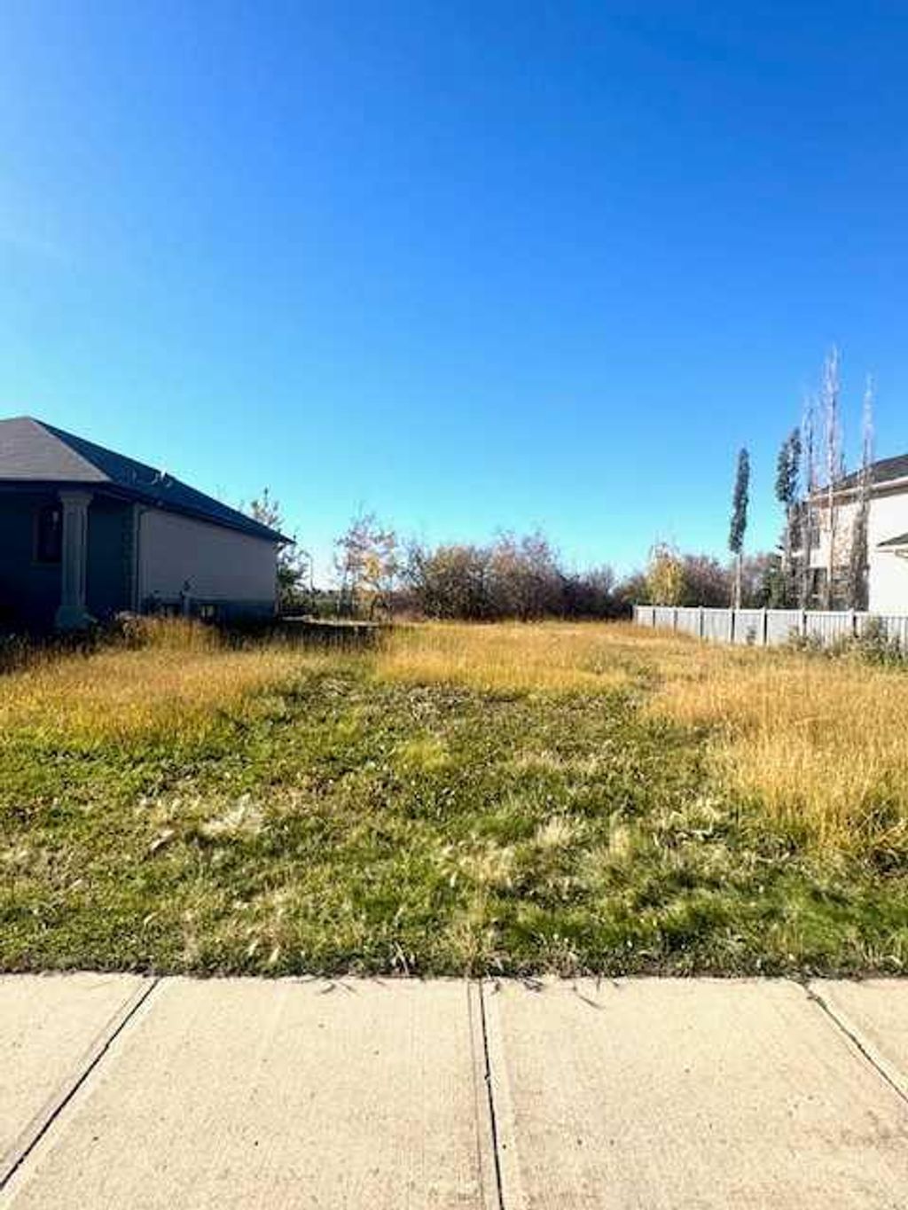 Photo of 12606 Lakeshore Drive, Grande Prairie, AB T8X 8C6 (MLS # A2283424)