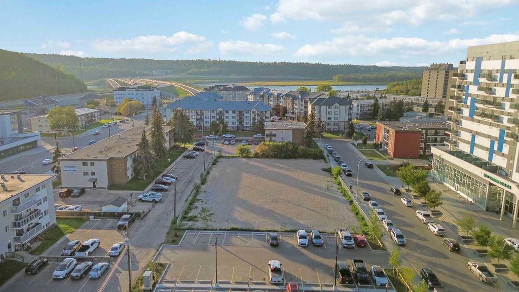 Photo of 10013-10119 MANNING Avenue, Fort McMurray, AB T9H 2C3 (MLS # A2255716)