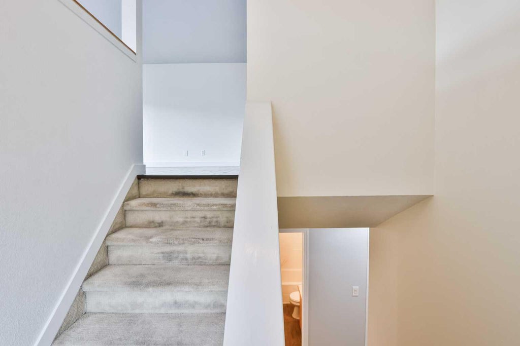 Photo of 304 Highlands Boulevard W #4, Lethbridge, AB T1J 4X7 (MLS # A2338878)