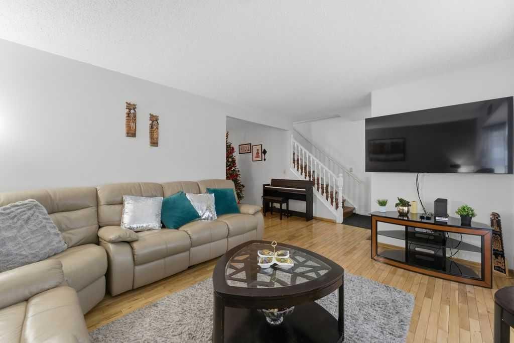 Photo of 1447 Berkley Drive NW, Calgary, AB T3K 1T6 (MLS # A2278837)