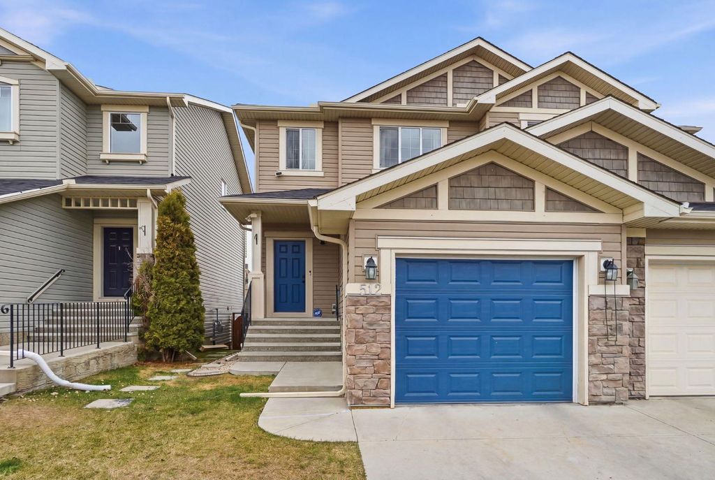Photo of 512 Panatella Square NW, Calgary, AB T3K 0T5 (MLS # A2299653)