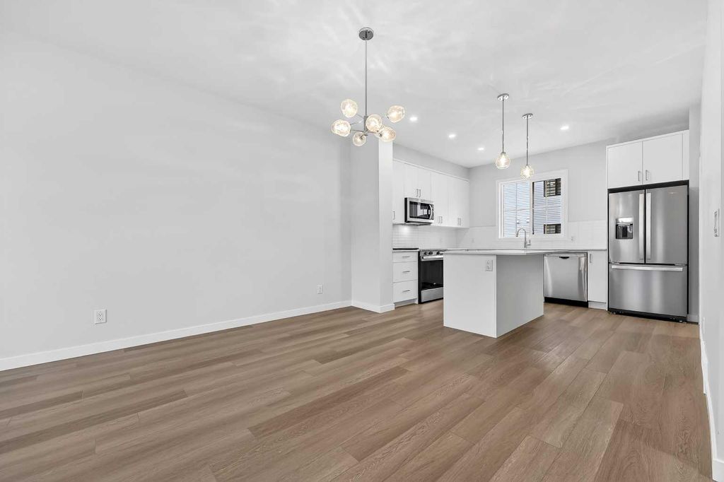 Photo of 10 Hotchkiss Parade SE, Calgary, AB T3S 0X5 (MLS # A2288578)