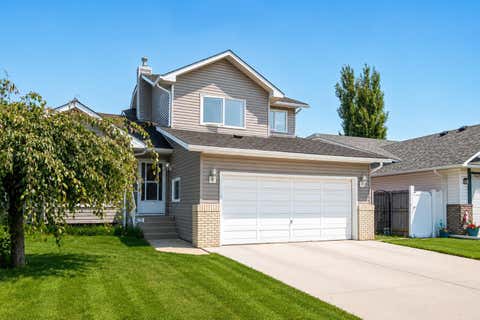 Photo of 136 Harvest Hills Drive NE, Calgary, AB T3K 3Y1 (MLS # A2331654)