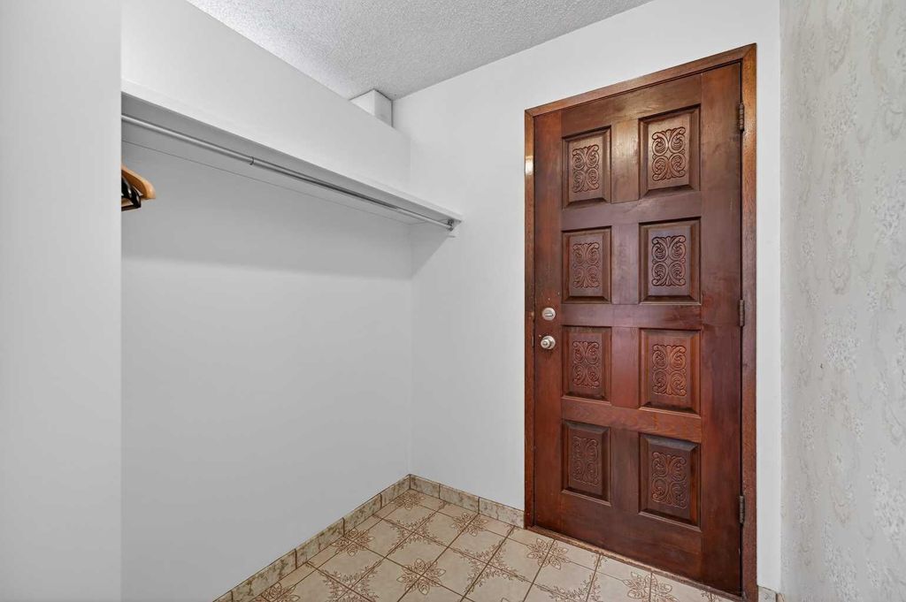 Photo of 7228 Huntridge Hill NE, Calgary, AB T2K 4A5 (MLS # A2289367)