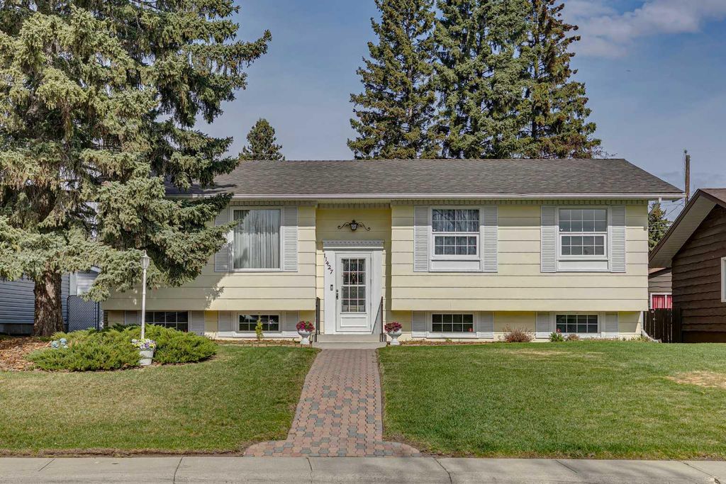 Photo of 11427 Wilkes Road SE, Calgary, AB T2J 2E5 (MLS # A2286031)