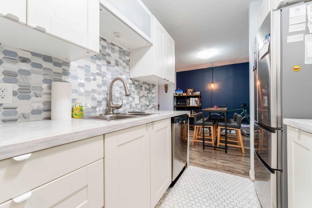 Photo of 924 14 Avenue SW #506, Calgary, AB T2R 0N7 (MLS # A2291350)