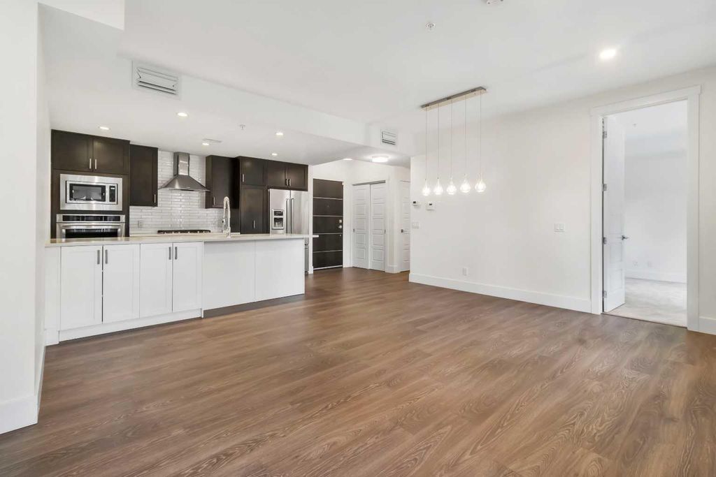 Photo of 3320 3 Avenue NW #106, Calgary, AB T2N 0L9 (MLS # A2301239)