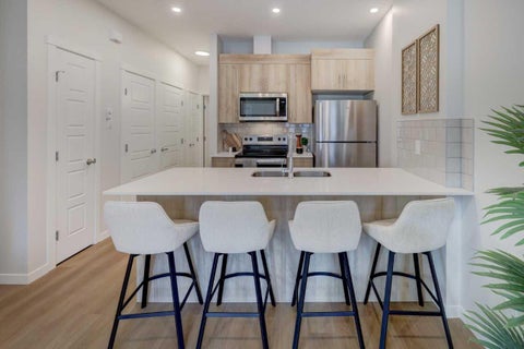 Photo of 155 Crimson Ridge Place NW #113, Calgary, AB T3L 2M4 (MLS # A2346229)