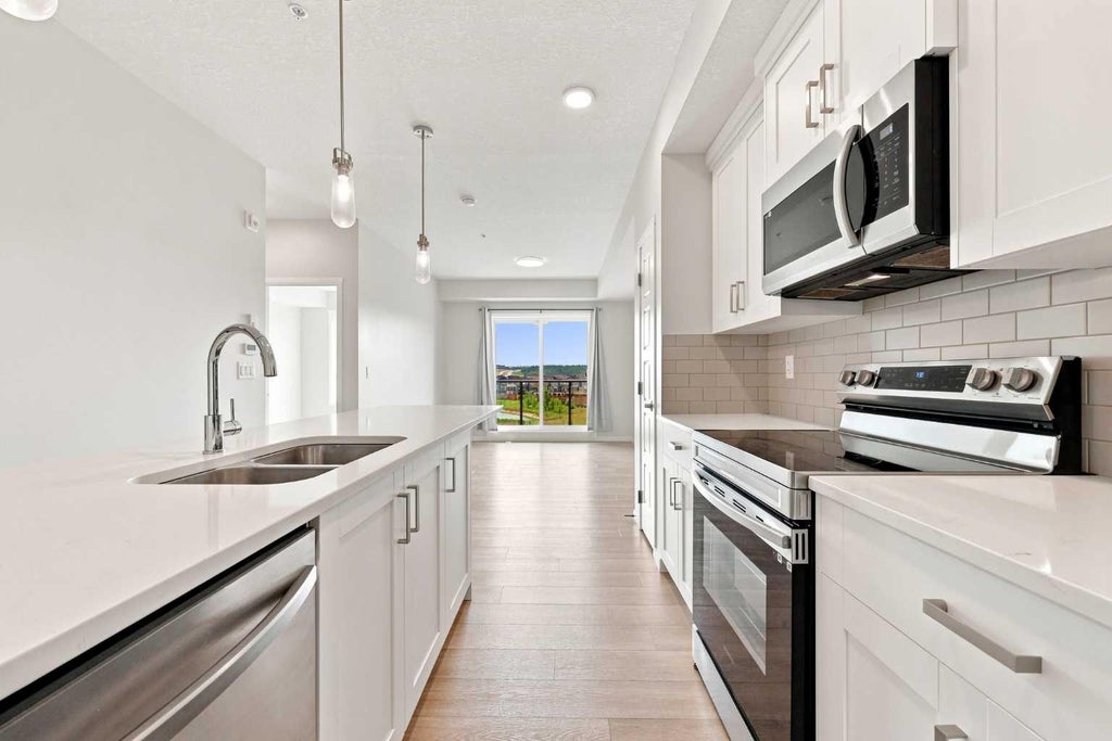 Photo of 42 Cranbrook Gardens SE #1307, Calgary, AB T3M 3P9 (MLS # A2336684)