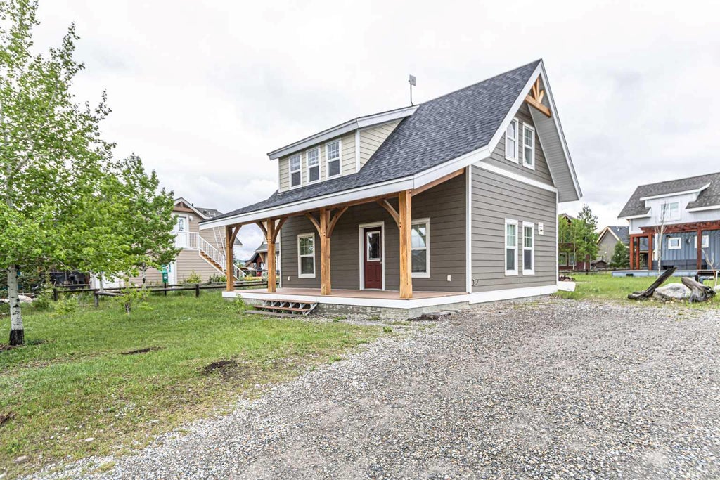 Photo of 201 Cottageclub Crescent, Rural Rocky View County, AB T4C 1C3 (MLS # A2312519)