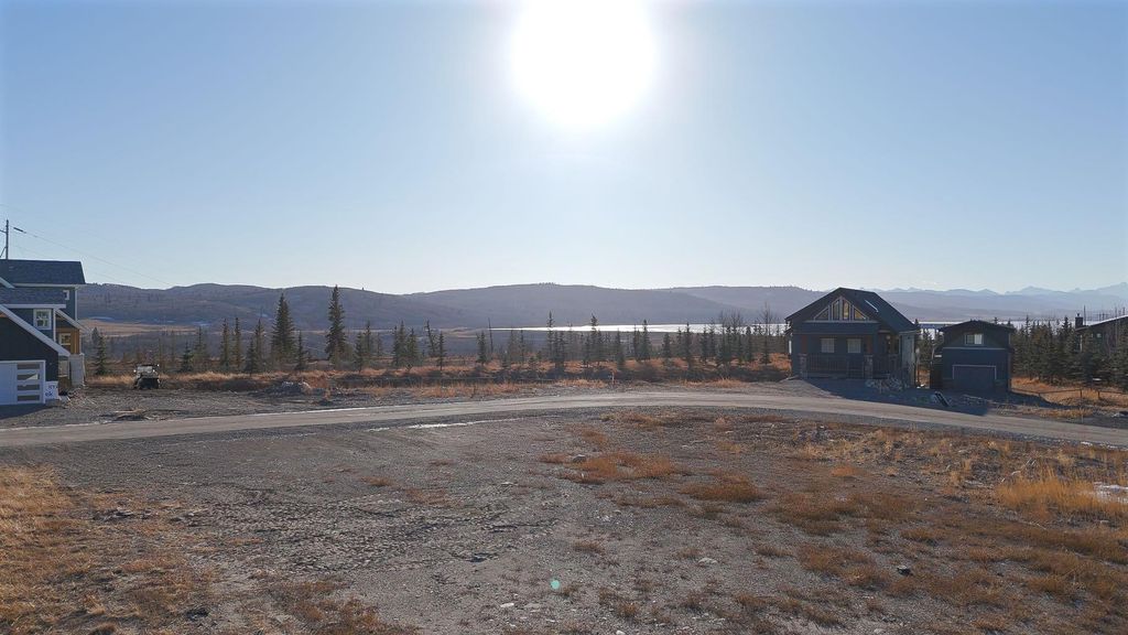 Photo of 624 Cottageclub Bend, Rural Rocky View County, AB T4C 1B1 (MLS # A2287874)