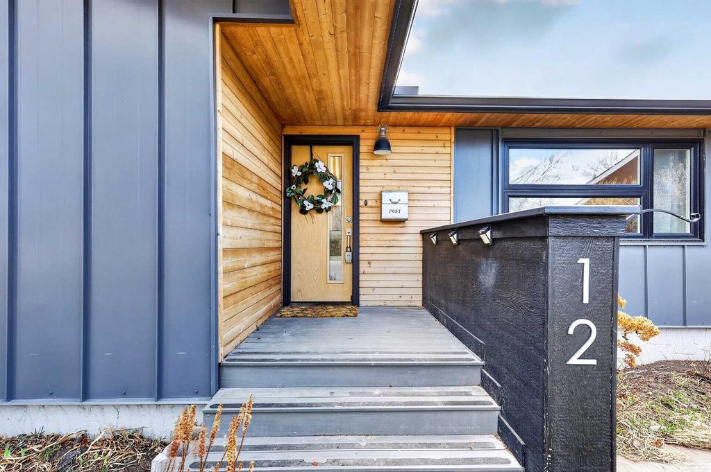 Photo of 12 Glacier Drive SW, Calgary, AB T3E 5A1 (MLS # A2305055)