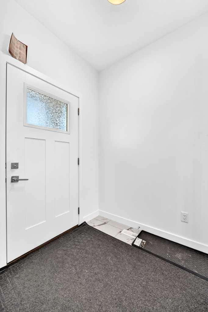 Photo of 118 Chelsea Mews, Chestermere, AB T1X 2T1 (MLS # A2337789)