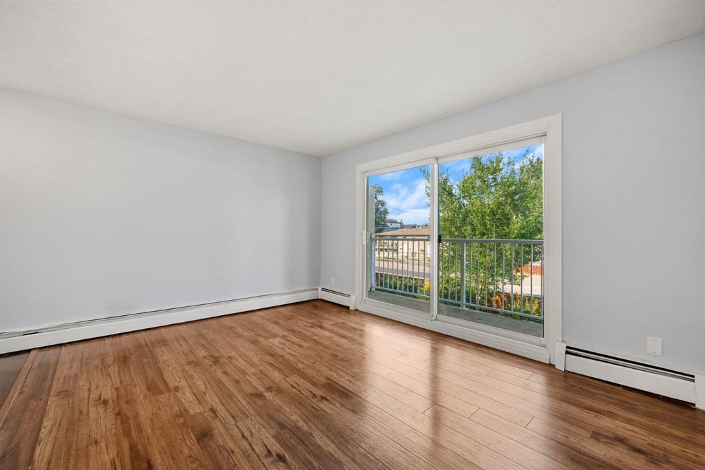 Photo of 4328 75 Street NW #5, Calgary, AB T3B 2M8 (MLS # A2341152)