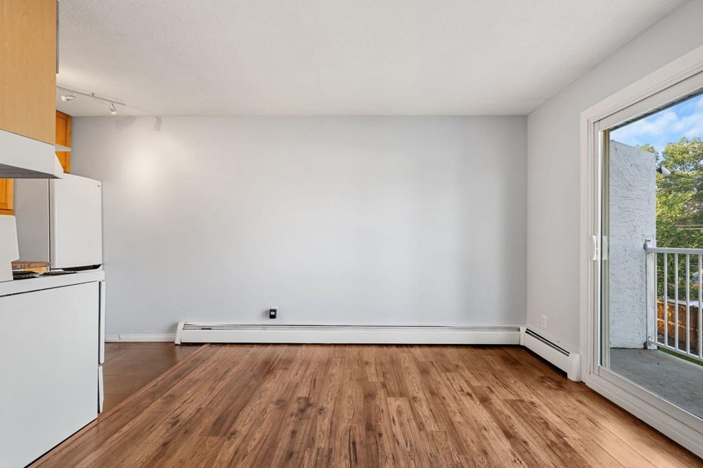Photo of 4328 75 Street NW #5, Calgary, AB T3B 2M8 (MLS # A2341152)