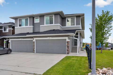 Photo of 125 Redstone Common NE, Calgary, AB T3N 0P6 (MLS # A2328004)
