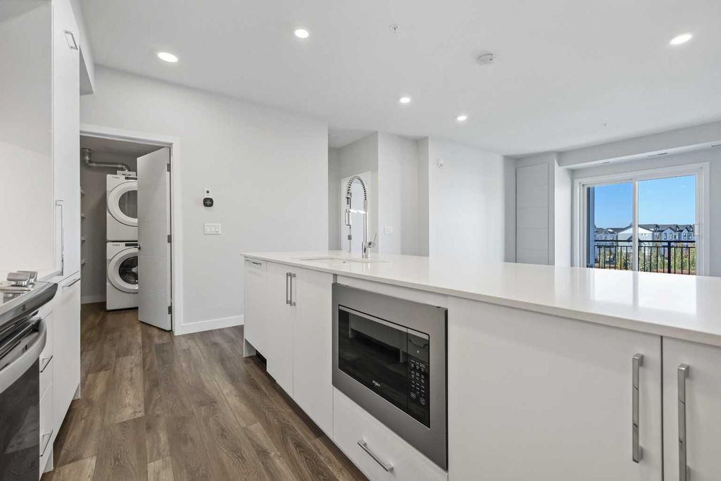 Photo of 255 Les Jardins Park SE #317, Calgary, AB T2C 5W9 (MLS # A2273835)