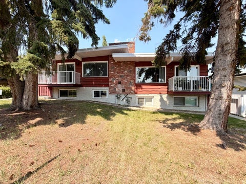 Photo of 11129 - 11131 Sacramento Drive SW, Calgary, AB T2W 0J5 (MLS # A2324329)