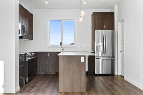 Photo of 40 Creekside Way SW #303, Calgary, AB T2X 6E2 (MLS # A2329248)