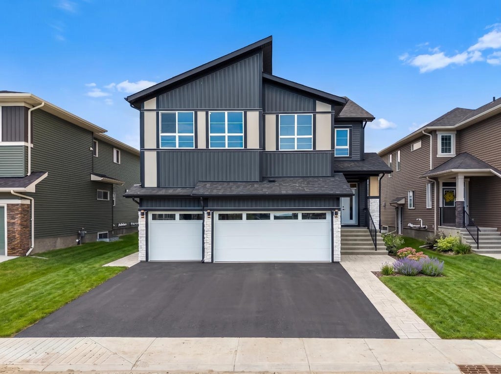 Photo of 83 Dawson Wharf Mount, Chestermere, AB T1X 2X6 (MLS # A2305515)