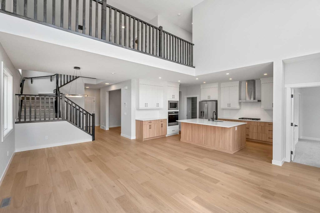 Photo of 83 Dawson Wharf Mount, Chestermere, AB T1X 2X6 (MLS # A2305515)