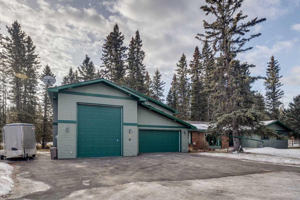 Photo of 22 Wolf Drive, Rural Rocky View County, AB T3Z 1A3 (MLS # A2285485)