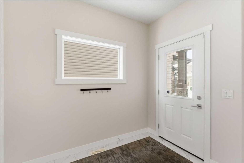 Photo of 42 Baysprings Way SW, Airdrie, AB T4B 3V1 (MLS # A2305364)