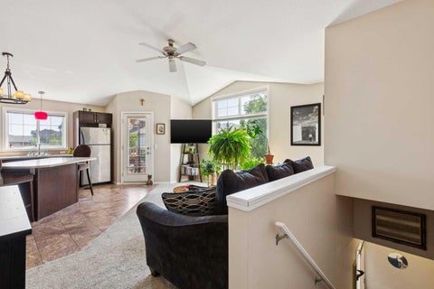 Photo of 60 Panatella Landing NW #201, Calgary, AB T3K 0K8 (MLS # A2338302)