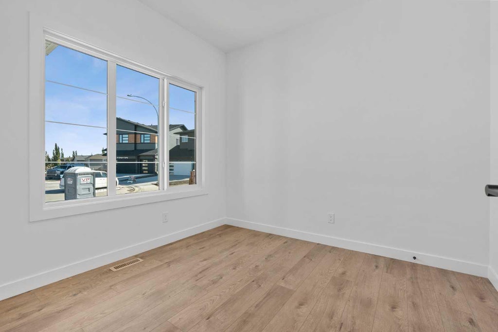 Photo of 94 Bridgeport Landing, Chestermere, AB T1X 3E3 (MLS # A2350258)