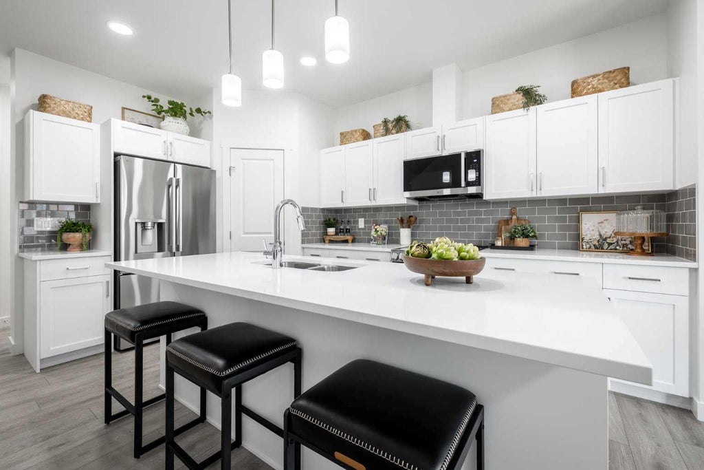 Photo of 31 Heritage Point, Cochrane, AB T4C 3K6 (MLS # A2348974)