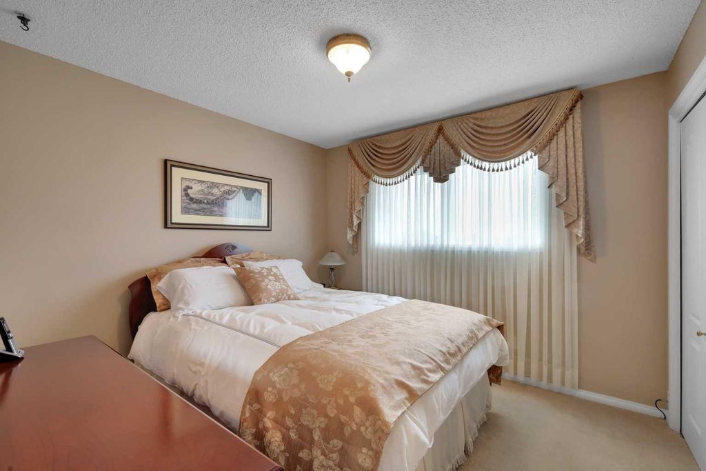 Photo of 1296 Berkley Drive NW, Calgary, AB T3K 1S9 (MLS # A2315338)
